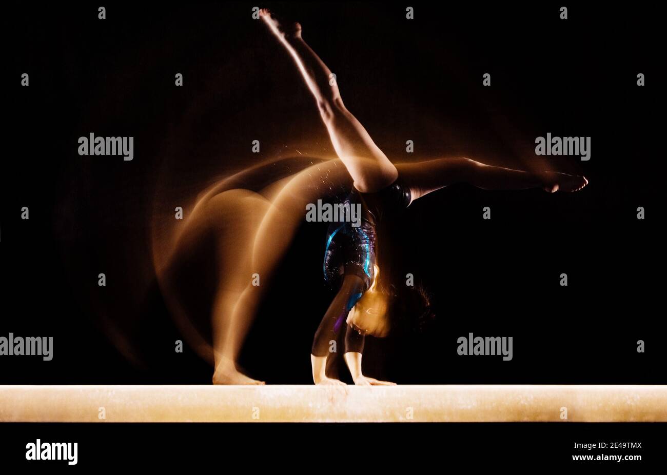 Gymnast Doing Split Handstand on Balance Beam Stock Photo Alamy