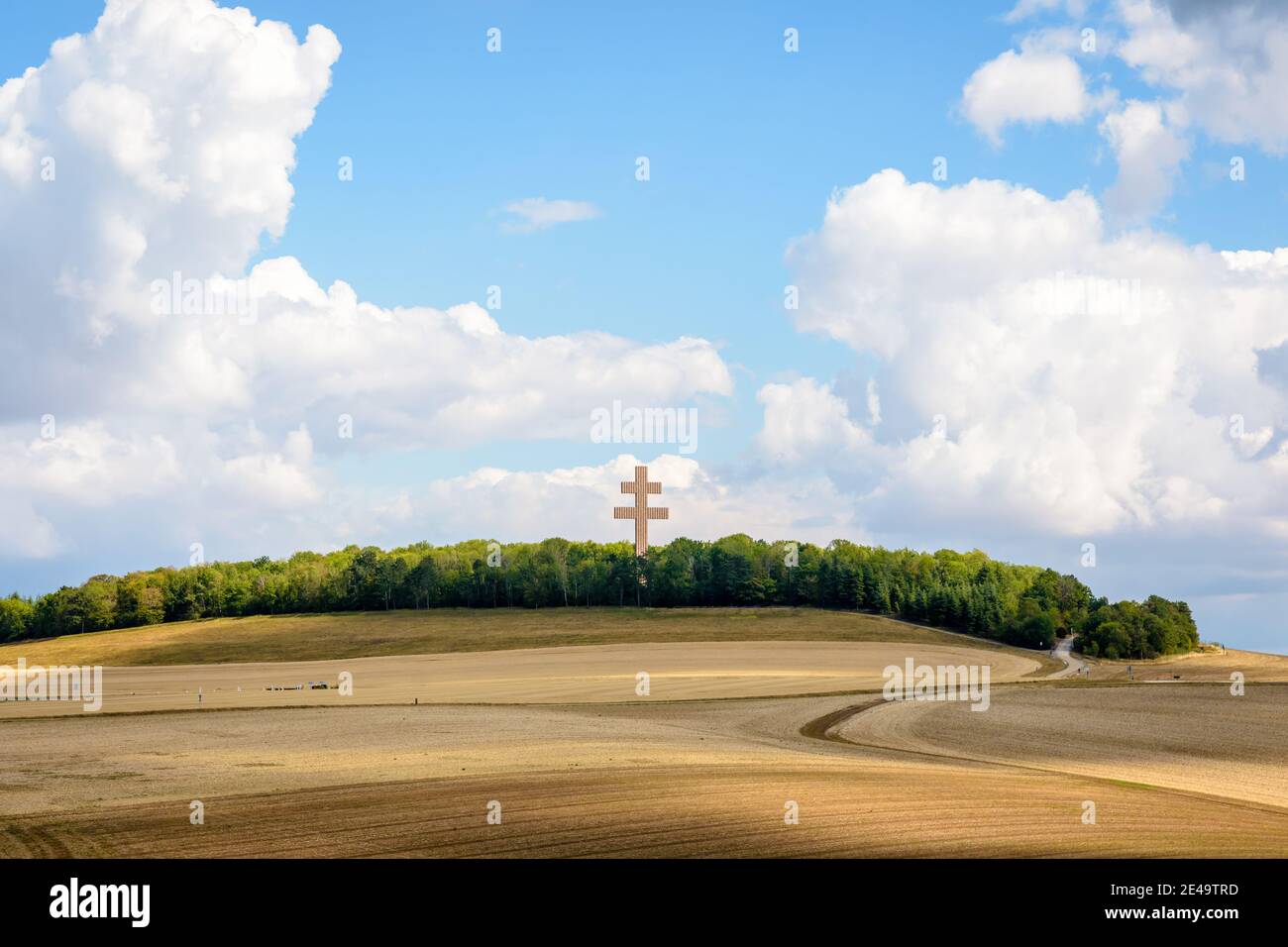 The large Cross of Lorraine of Charles de Gaulle Memorial dominates a rolling countryside landscape from the top of a hill. Stock Photo