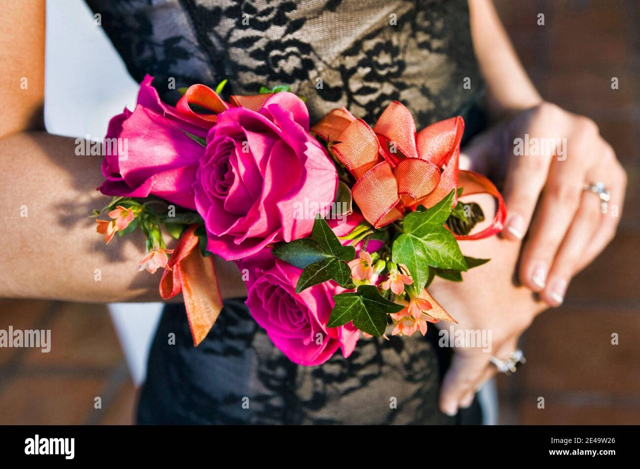 Close up photo of woman in prom with corsage Stock Photo