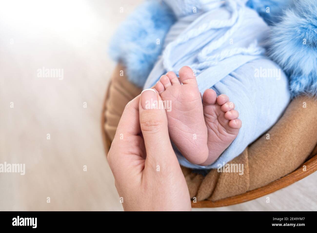 banner. Newborn baby feet. Motherhood concept. Mother day. Copy space. Newborn baby feet. Motherhood concept. Mother day. Copy space. Stock Photo