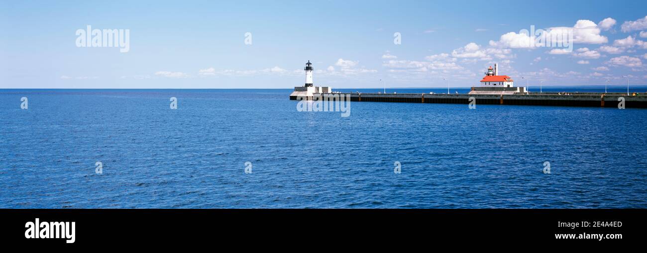 Lighthouse on a pier in a lake, Lake Superior, Duluth, Minnesota, USA Stock Photo