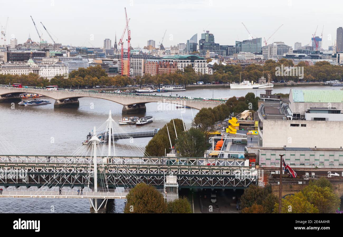 London, United Kingdom - October 31, 2017: London cityscape, aerial view showing Hungerford Bridge and Golden Jubilee Bridges and Waterloo Bridge on a Stock Photo