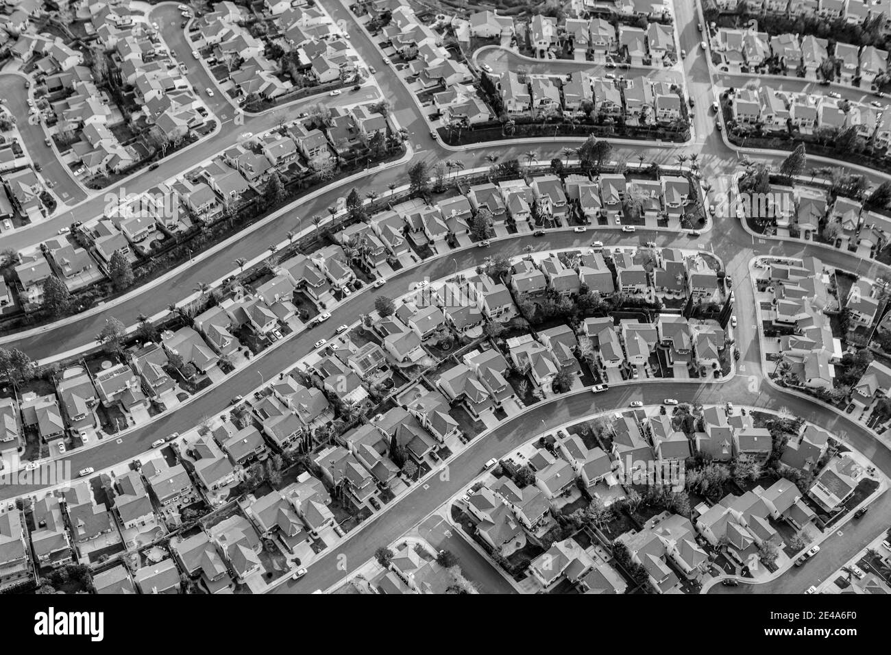 Black and white aerial view of tightly packed homes in the Porter Ranch neighborhood of Los Angeles, California. Stock Photo