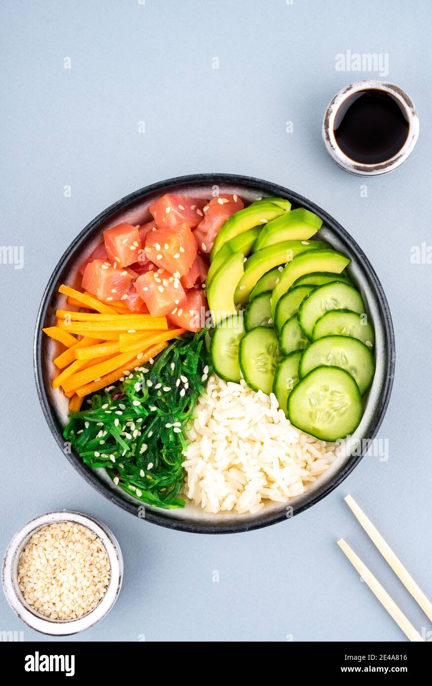 An overhead photo of poke bowl, traditional Hawaiian and Japanise raw ...
