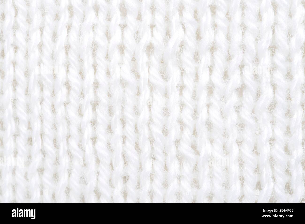 Close-up of hand made white cotton knit texture. Stock Photo