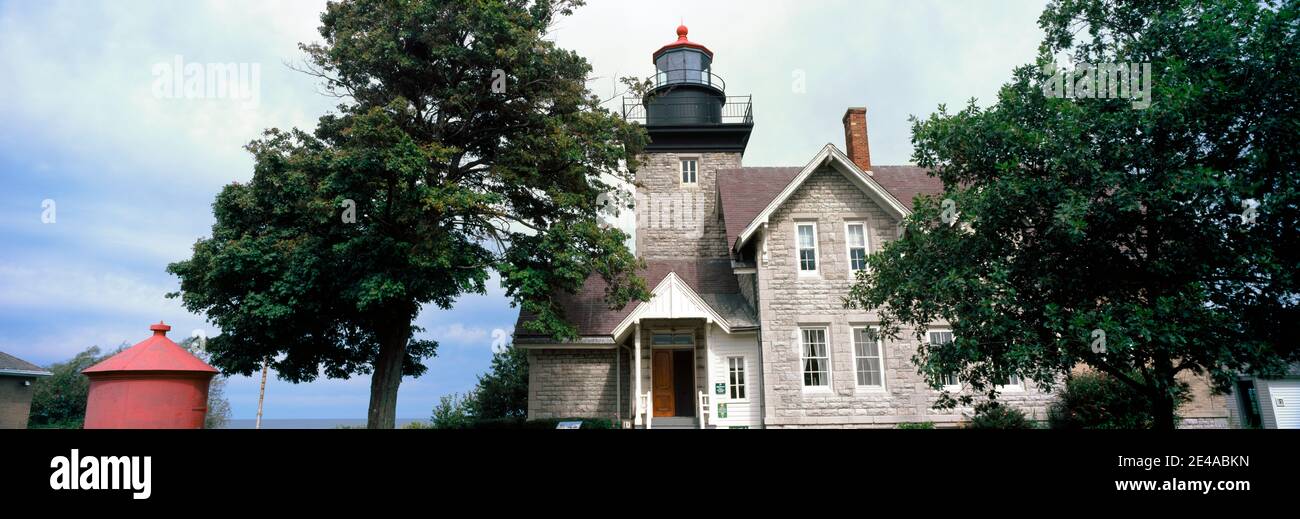 Low angle view of a lighthouse, Thirty Mile Point Light, Golden Hill State Park, Barker, Niagara County, New York State, USA Stock Photo