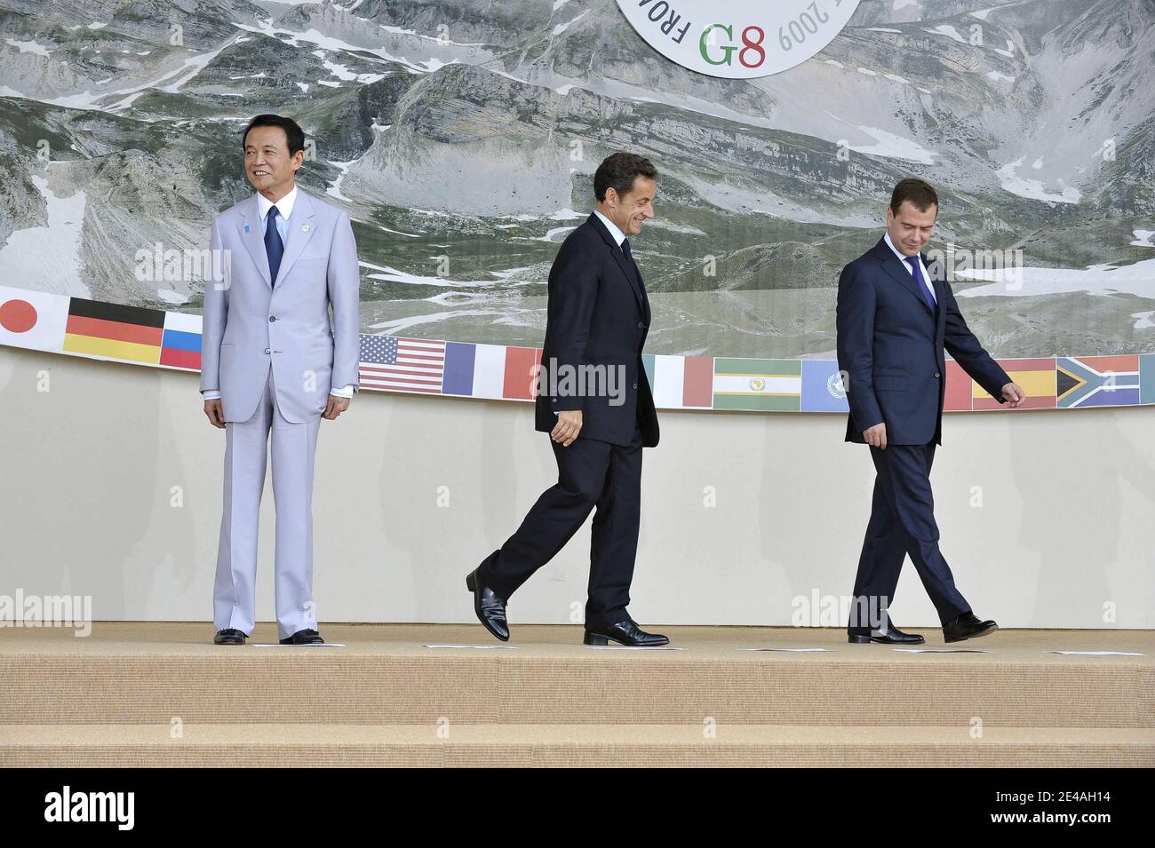 (L-R) Japanese Prime Minister Taro Aso, French President Nicolas Sarkozy and Russian President Dmitry Medvedev arrive to pose for a family photo at the Guardia Di Finanza School of Coppito during G8 Summit in L'Aquila, Italy, on July 8, 2009. Photo by Elodie Gregoire/ABACAPRESS.COM Stock Photo