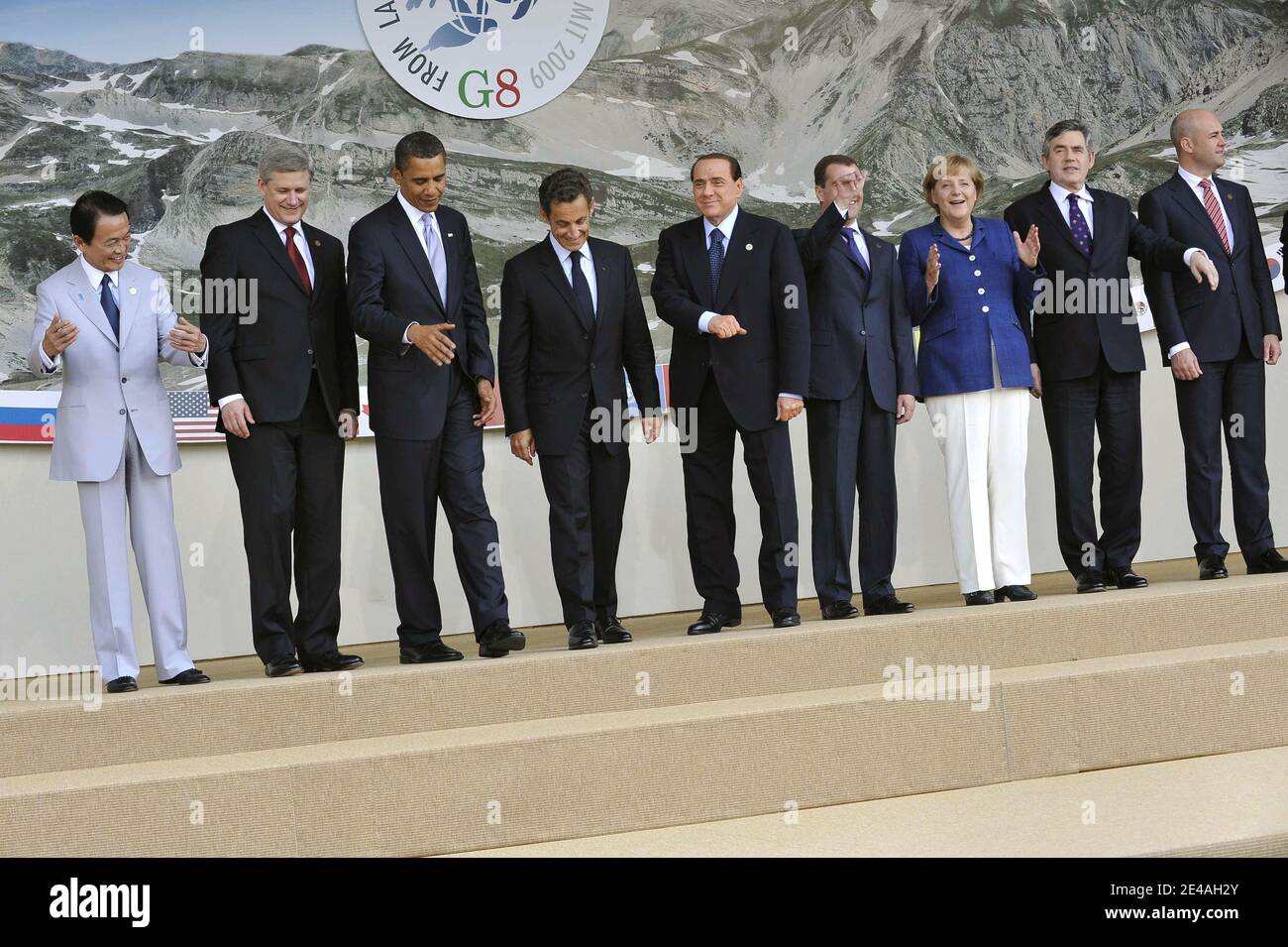 (L-R) Japanese Prime Minister Taro Aso, Canadian Prime Minister Stephen Harper, US President Barack Obama, French President Nicolas Sarkozy, Italian Prime Minister Silvio Berlusconi, Russian President Dmitry Medvedev, German Chancellor Angela Merkel, British Prime Minister Gordon Brown and Swedish Prime Minister Fredrik Reinfeldt pose for a family photo at the Guardia Di Finanza School of Coppito during G8 Summit in L'Aquila, Italy, on July 8, 2009. Photo by Elodie Gregoire/ABACAPRESS.COM Stock Photo