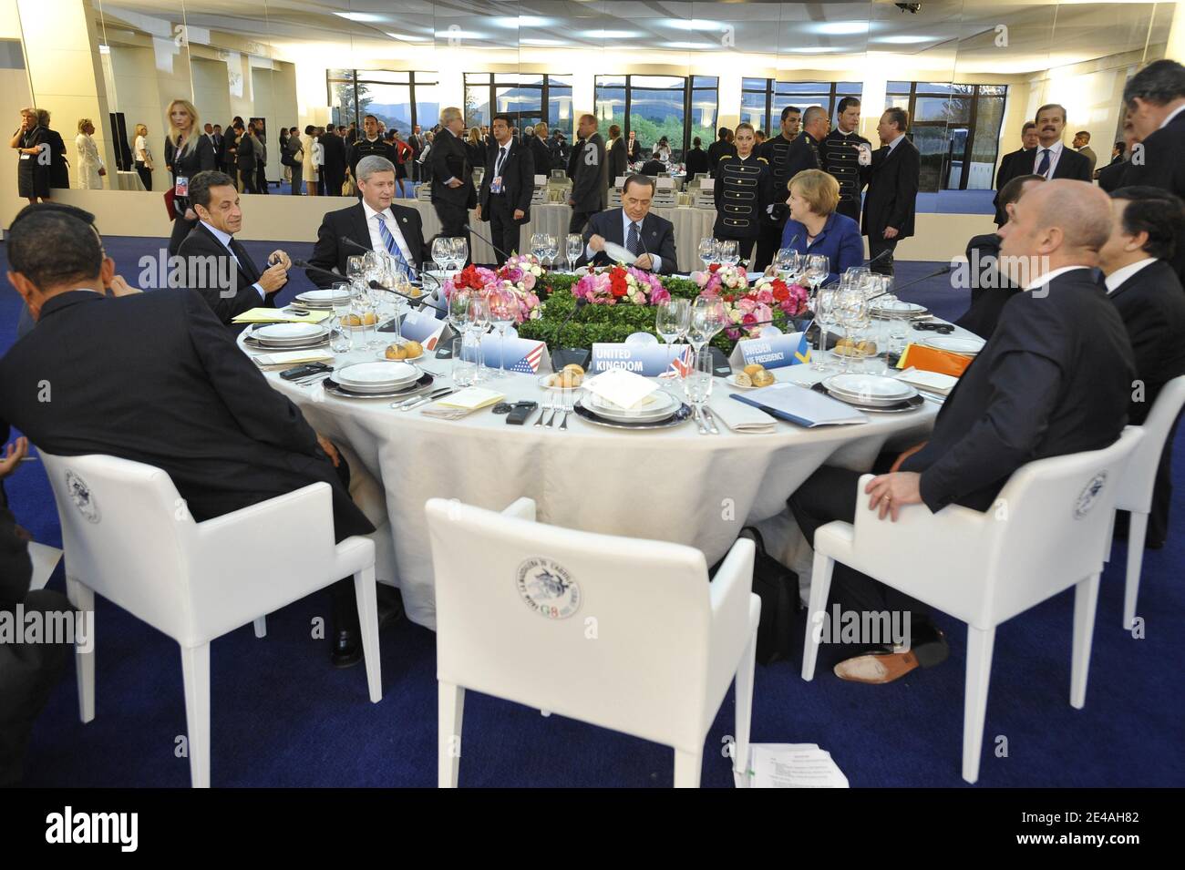 Japanese Prime Minister Taro Aso, French President Nicolas Sarkozy, Canadian Prime Minister Stephen Harper, Italian Prime Minister Silvio Berlusconi, German Chancellor Angela Merkel, Head of the European Commission Jose Manuel Barroso, Swedish Prime Minister Fredrik Reinfeldt and US President Barack Obama attend a meeting during G8 Summit in L'Aquila, Italy, on July 8, 2009. Photo by Elodie Gregoire/ABACAPRESS.COM Stock Photo