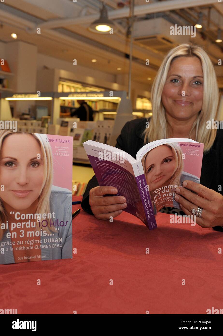 Sophie Favier signs her new book at the Galeries Lafayette in Paris, France on July 9, 2009. Photo by Giancarlo Gorassini/ABACAPRESS.COM Stock Photo