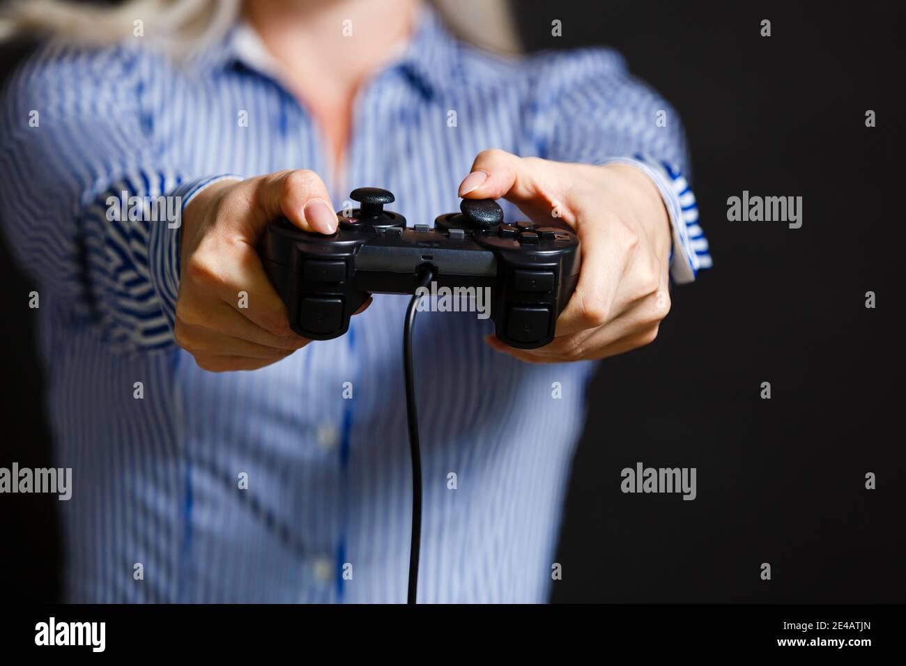 Girl playing video game with joystick Stock Photo Alamy