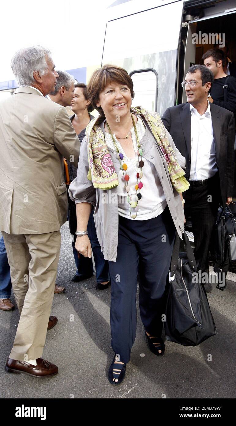 Exclusive. French socialist first secretary Martine Aubry flancked by Francois Lamy arrives at La Rochelle train station received by Maxime Bono, mayor of La Rochelle to the socialist party's summer university during the week end France, on August 28, 2009. Photo by Patrick Bernard/ABACAPRESS.COM Stock Photo