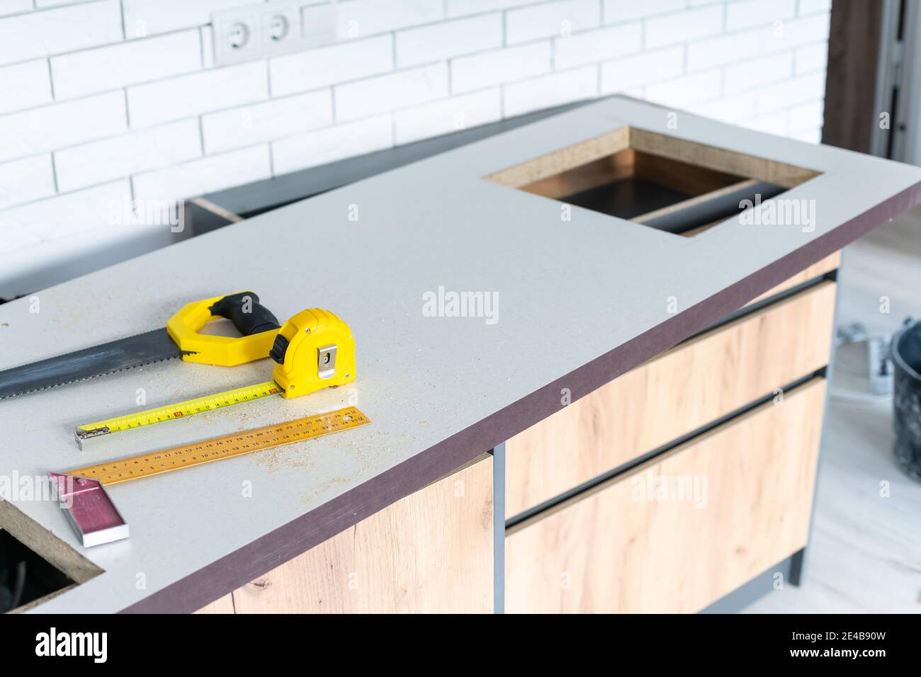 In the kitchen, the square is squarecut for installation of the