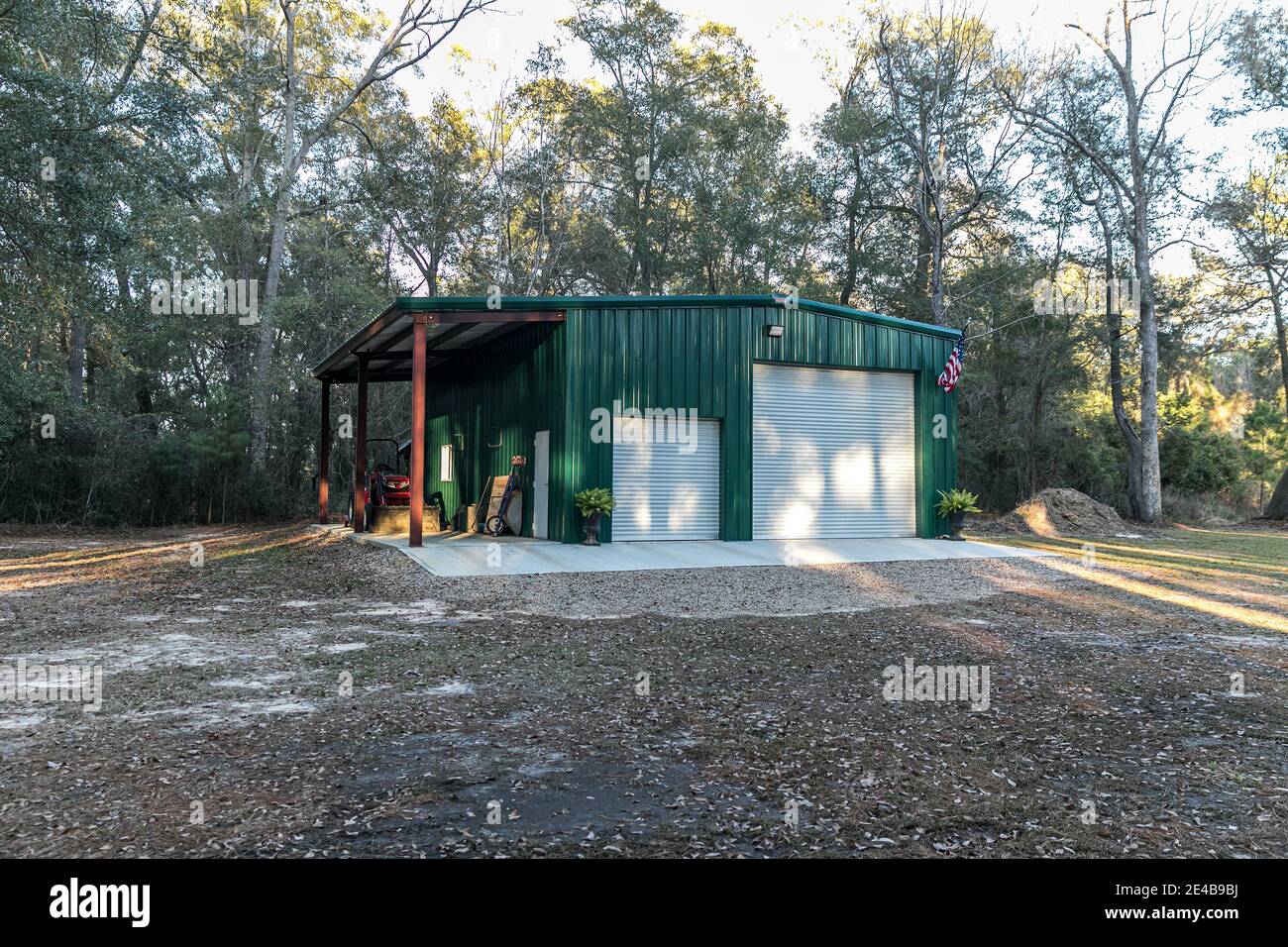Large green outdoor metal building Stock Photo Alamy