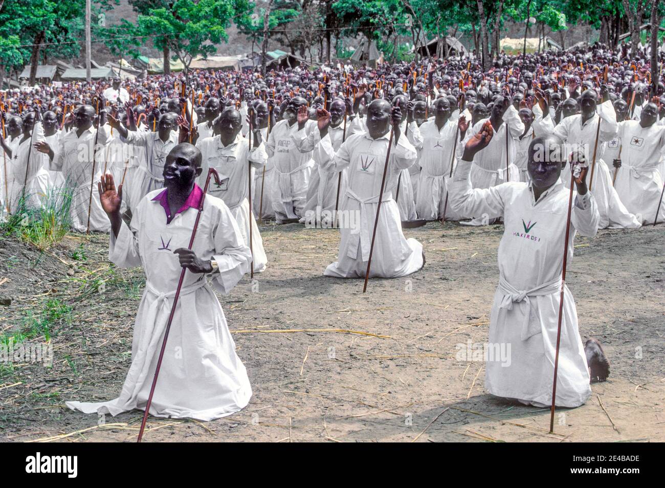 Gathering of black Apostolic men praying Zimbabwe Africa Stock Photo