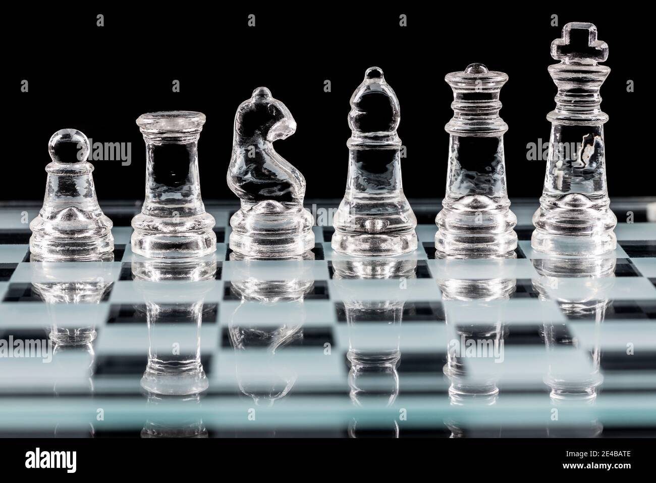 3D illustration Chess game on board. Concepts business ideas and strategy  ideas. Glass chess figures on a dark background with depth of field effects  Stock Photo - Alamy