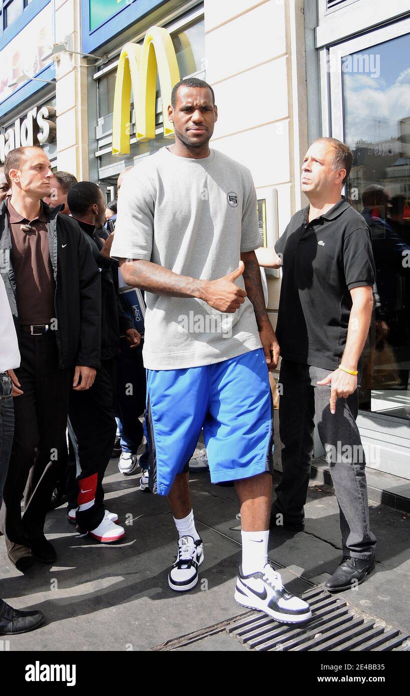 Lebron James of the Cleveland Cavaliers leaving the McDonald's on Place  Clichy in Paris, France on September 2nd, 2009 and inaugurating a  playground with 9th District's Mayor Jacques Bravo. Photo by ABACAPRESS.COM