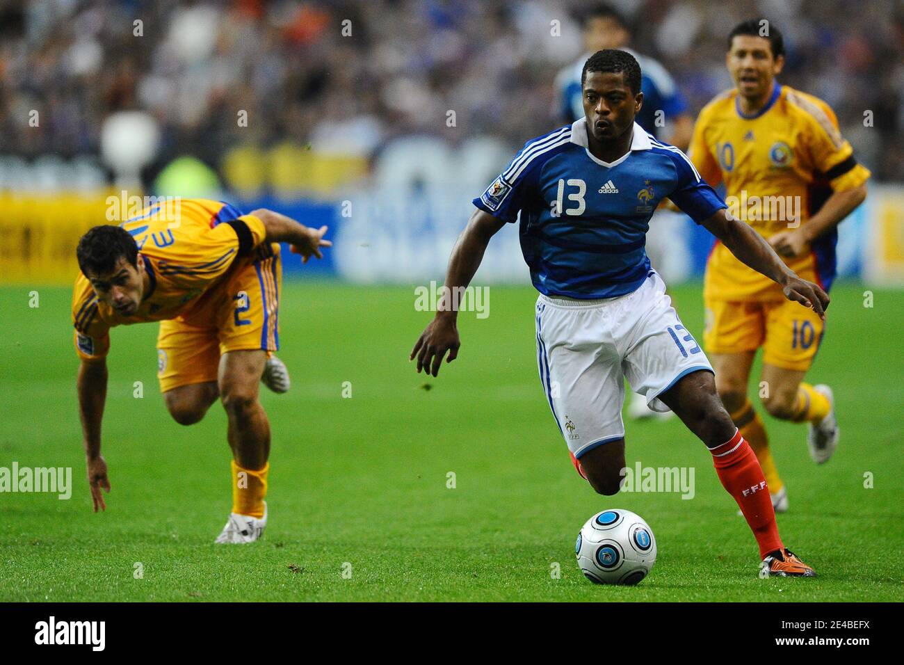 Romania's Vasile Maftei, France's Patrice Evra and Romania's Bogdan Mara during the World Cup, group 7, qualifying soccer match, France vs Romania at the Stade de France in Saint-Denis near Paris, France on September 5, 2009. The match ended in a 1-1 draw. Photo by Christian Liewig/ABACAPRESS.COM Stock Photo