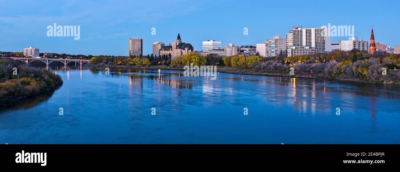 Skylines at waterfront, South Saskatchewan River, Saskatoon, Saskatchewan, Canada Stock Photo