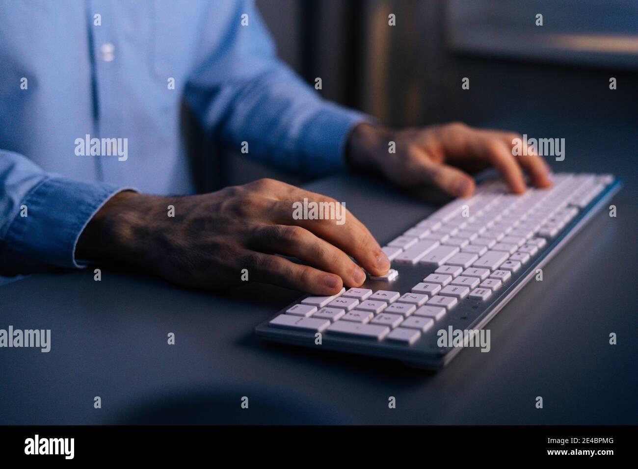 Man hands computer keyboard night hi-res stock photography and images ...