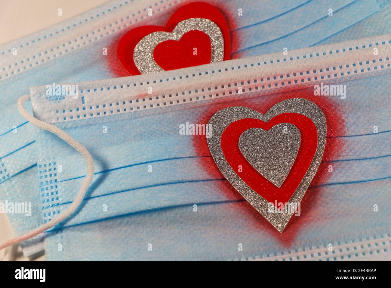 Red And Silver Heart Medical Facemasks Stock Photo