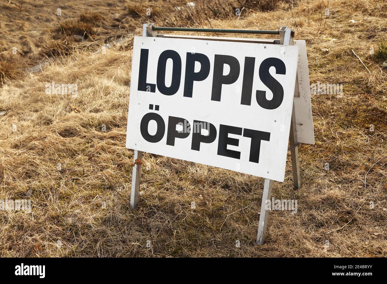 Sign with text in the Swedish language informs that the flea market is open. Stock Photo
