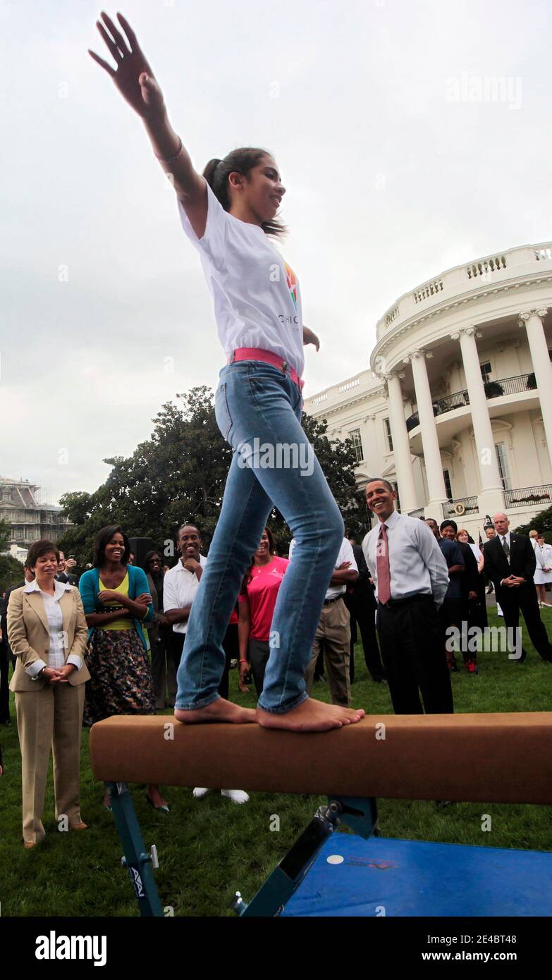 President Barack Obama, his wife Michelle and Senior Advisor Valerie ...