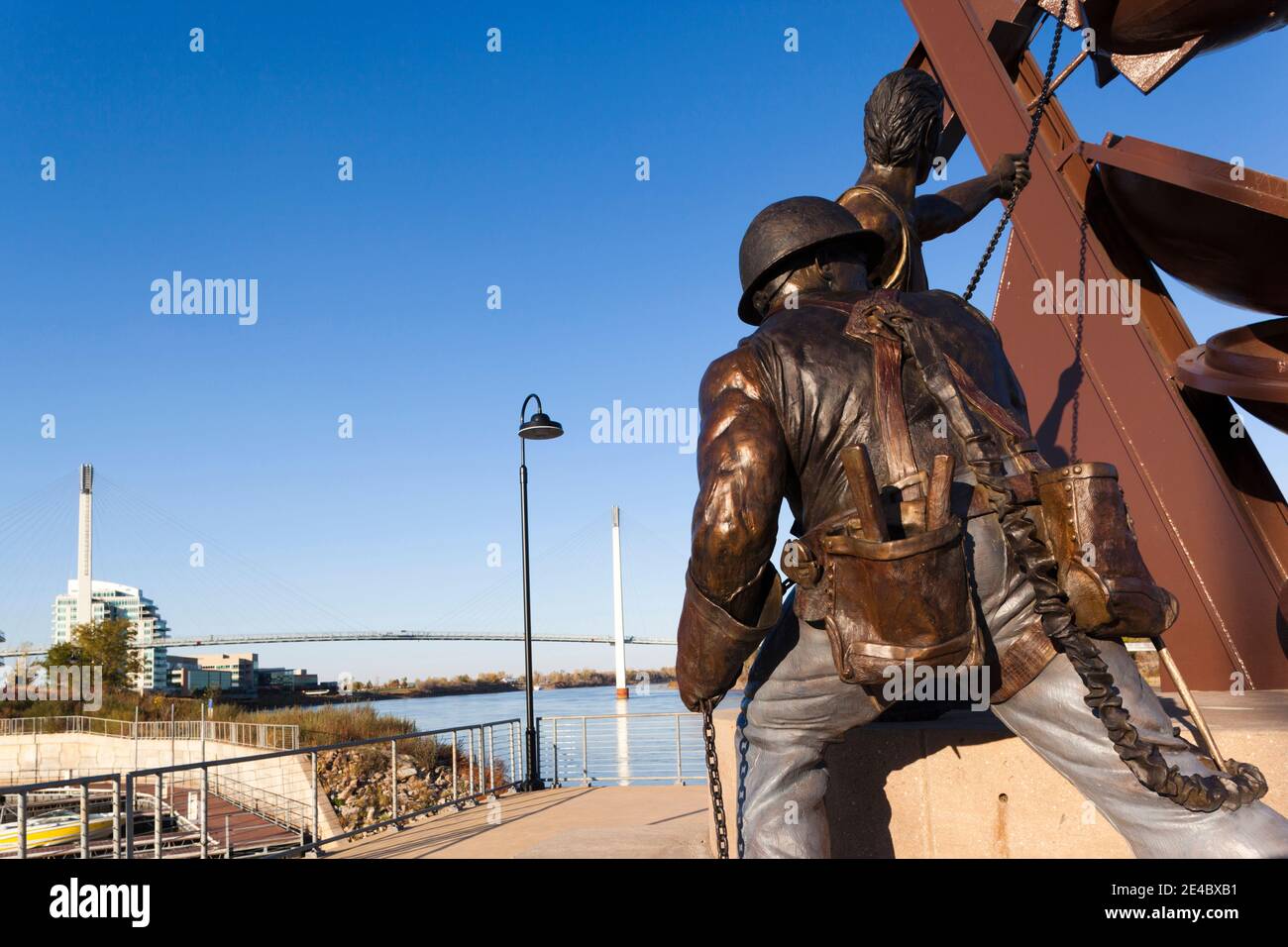 Statues and Bob Kerrey Pedestrian Bridge on Missouri River, Omaha, Douglas County, Nebraska, USA Stock Photo