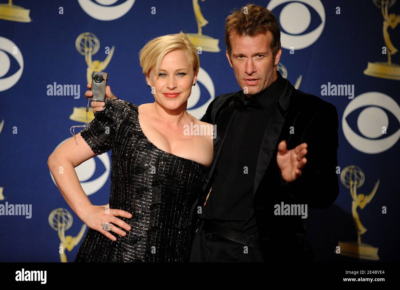Patricia Arquette and Thomas Jane posing in the press roomm of the 61st