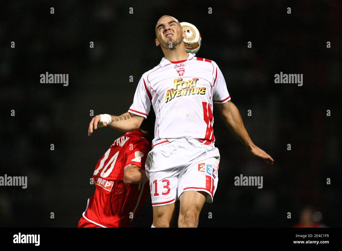 Nancy's Macaluso Damian fights for the ball with Monaco's Park Chu Young during the French League Cup Soccer Match, AS Nancy Lorraine vs AS Monaco at Marcel Picot Stadium in Nancy, east of France, on September 23, 2009. Nancy won 2-0. Photo by Mathieu Cug Stock Photo
