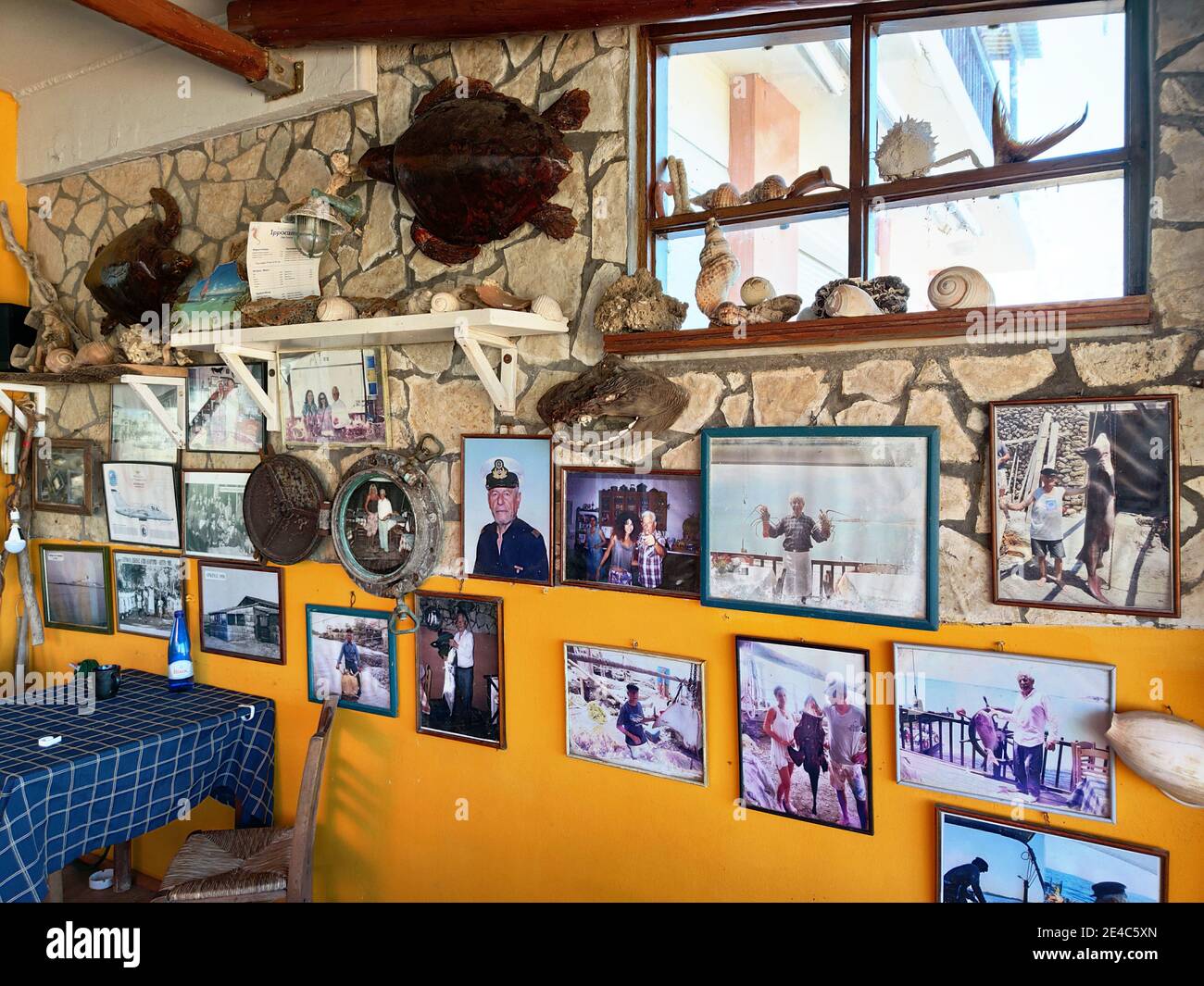 Memories and trophies of a fisherman from old times, in the fishing village of Arkoudi, Elis, Peloponnese, Greece Stock Photo