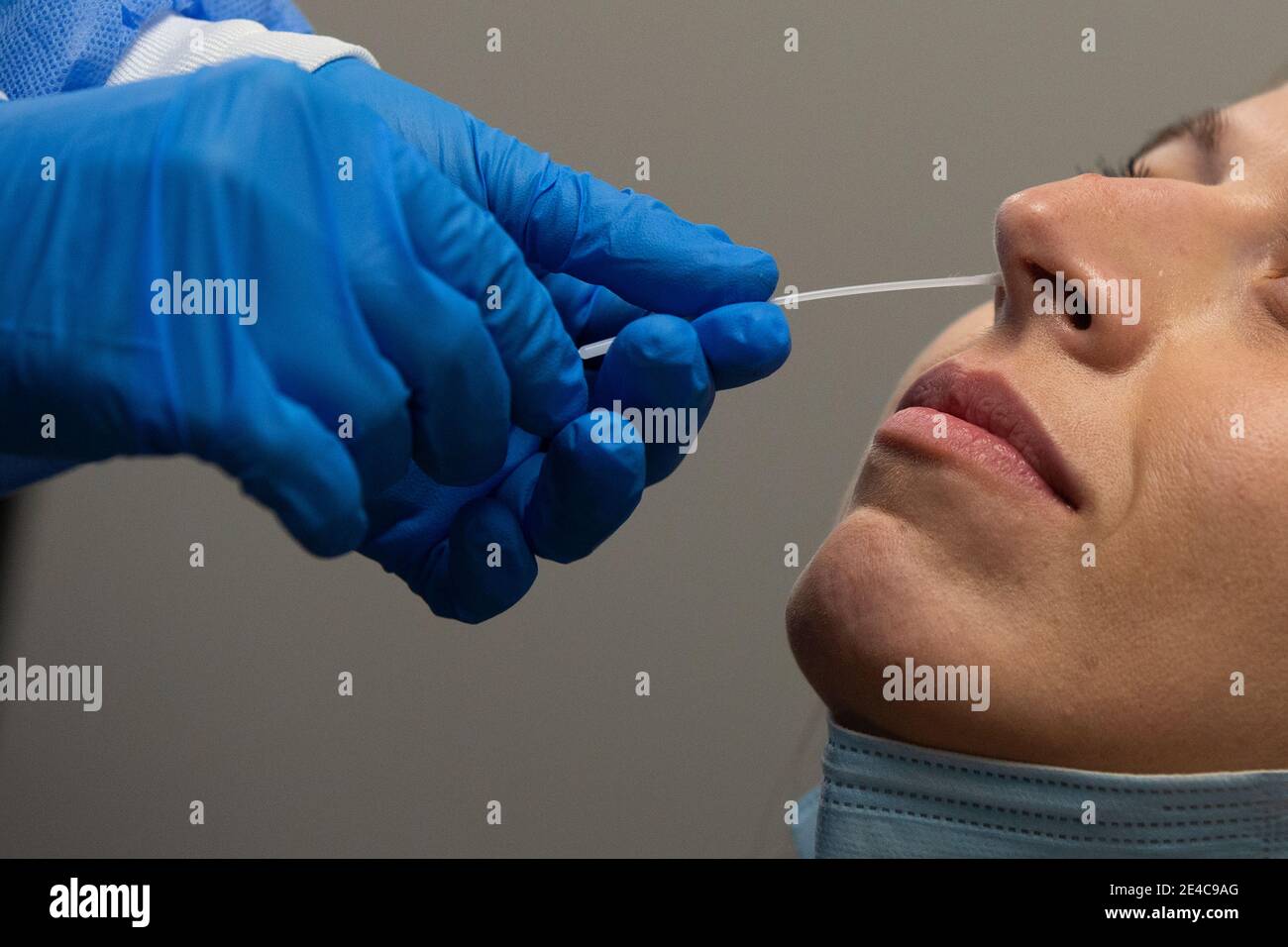 A person gets tested for COVID-19 at a pharmacy in Amherstview, Ontario on Friday, January 22, 2021, as the COVID-19 pandemic continues across Canada Stock Photo