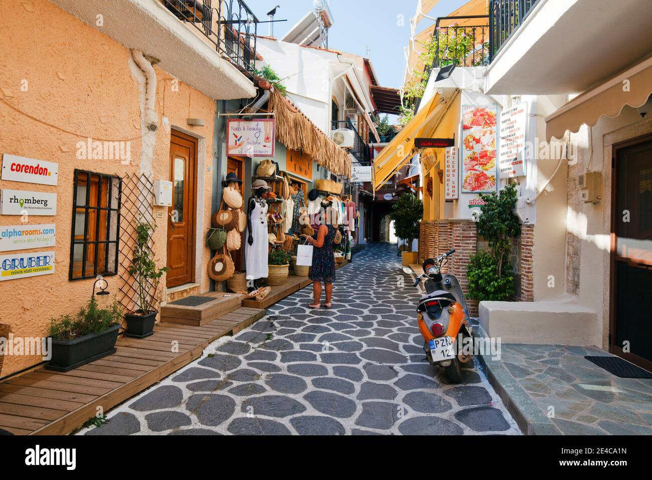 Alley with boutiques in Parga, Epirus, Northern Greece Stock Photo