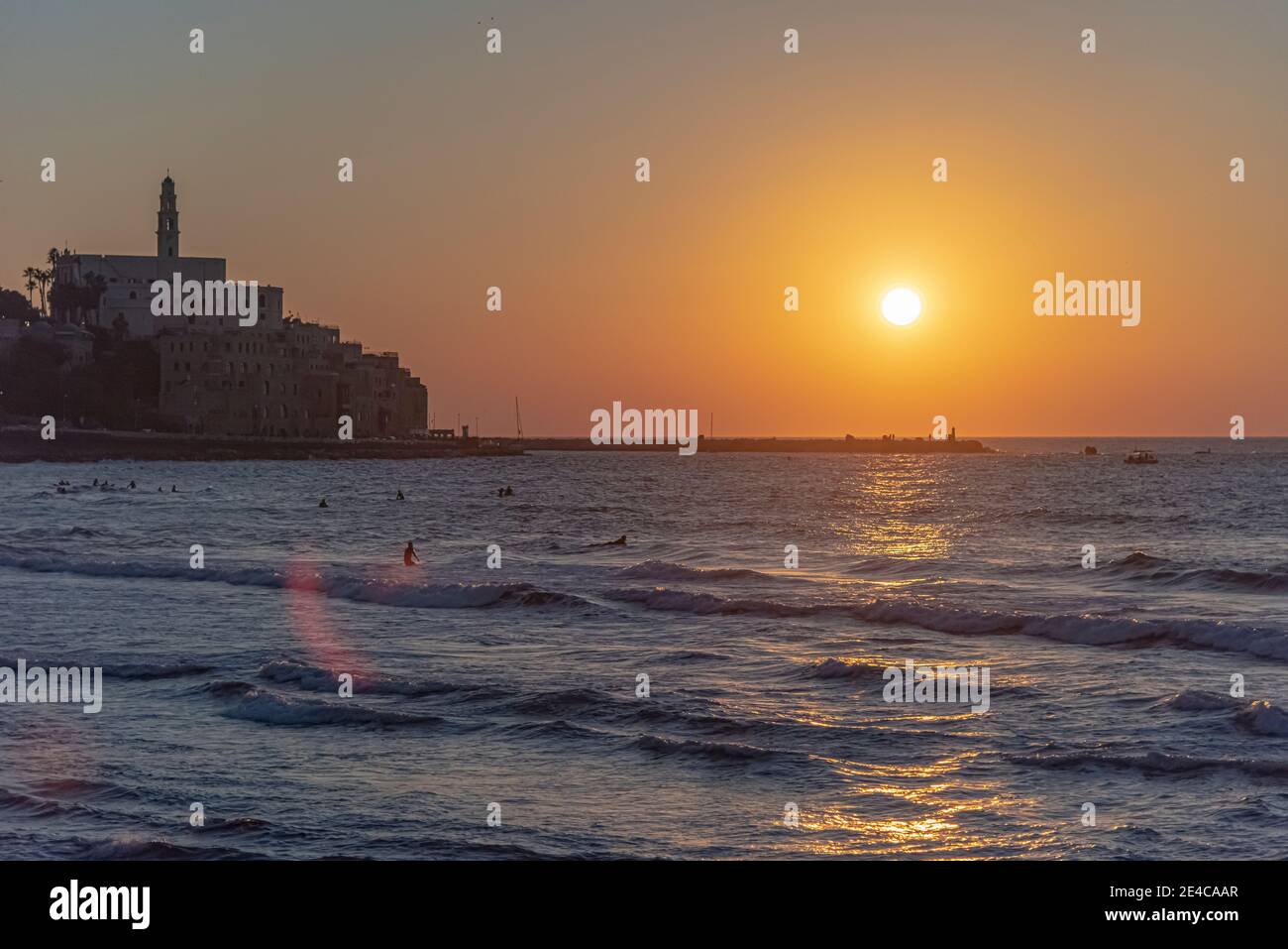 Tel Aviv, Israel - December 25, 2020: Beautiful view of a beach in the Old Port of Jaffa during a sunny and colorful sunset. High quality photo Stock Photo