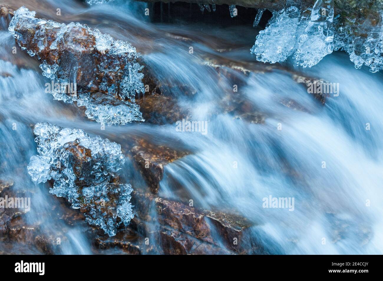 Italy, Veneto, Belluno, Agordino, Dolomites, ice formations on the river bank in winter Stock Photo