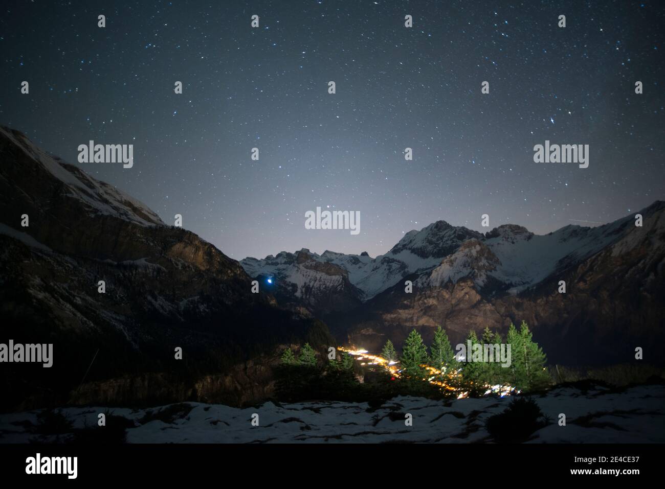 At night, under the stars in the mountains Stock Photo