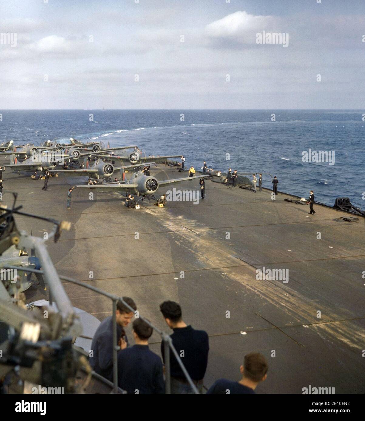 Grumman Wildcat fighter aircraft and Supermarine Seafires ranged for take-off on the flight deck of HMS Formidable, 1942 Stock Photo