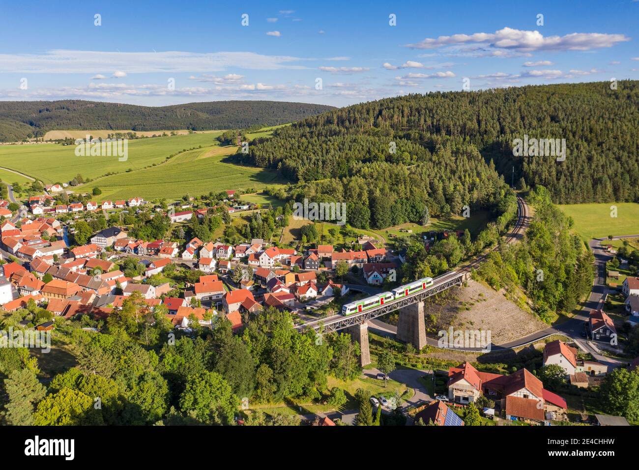 Germany, Thuringia, Martinroda, Angelroda, train, bridge, village, overview, aerial picture Stock Photo