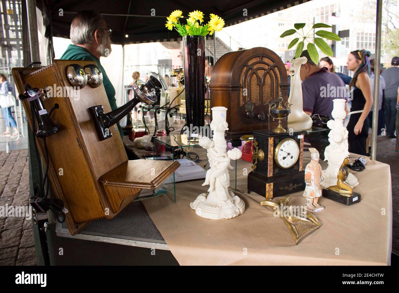 Sao Paulo / SP / Brazil - 01 03 18: Flea market with various objects and people near the stuff. Stock Photo