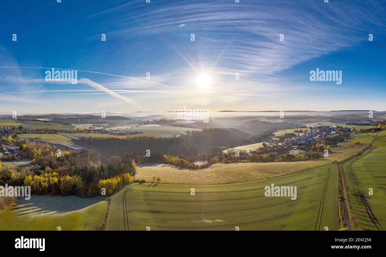 Germany, Thuringia, Großbreitenbach, Willmersdorf, forest, mountains, valleys, sun, back light, aerial view Stock Photo