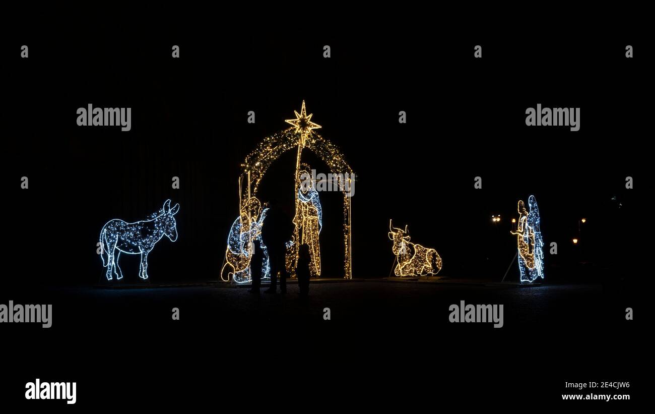 Germany, Saxony-Anhalt, Magdeburg, illuminated Christmas crib in front of the west portal of the cathedral, part of the Magdeburg world of lights Stock Photo