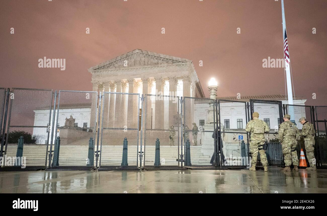 Washington, District of Columbia, U.S.A. 22nd Jan, 2021. Pre-Inaugural security preparations take shape on Capitol Hill and around the Supreme Court following the January 6th insurrection by President Donald Trump's supporters due to his assertions that the election had been stolen from him. Fencing topped with razor wire surrounds the grounds with streets deserted due to the ongoing lockdown in preparation for President-Elect Joe Biden's Inauguration. Credit: Mark Finkenstaedt/ZUMA Wire/Alamy Live News Stock Photo