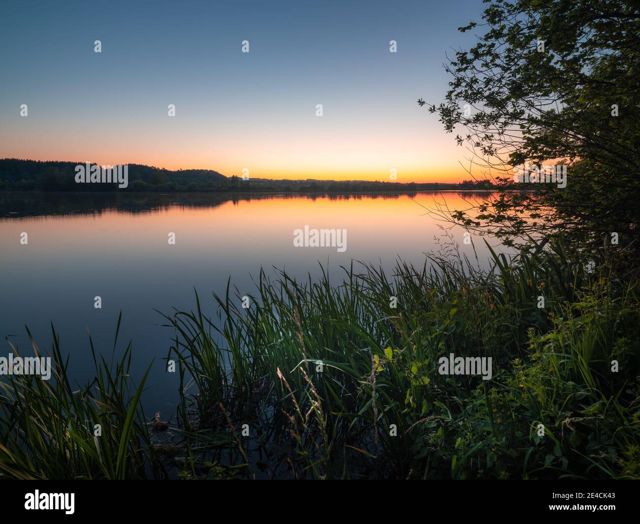 Sunset on the shores of a Bavarian lake, Bärensee, Kaufbeuren Stock Photo