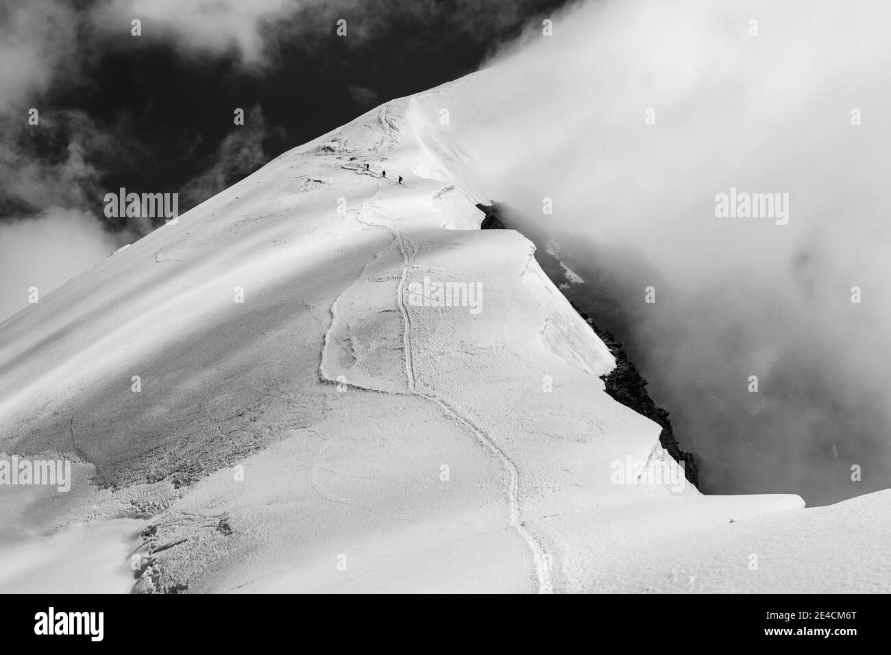 Switzerland, Canton of Valais, Saas Valley, Saas-Grund, mountaineers on the ascent of Weissmies west ridge Stock Photo