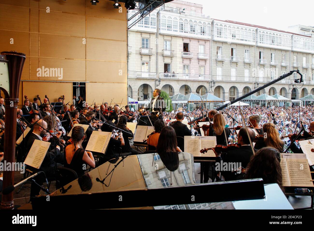 Coruna, Spain. Orchestra conductor conducting the musicians of the ...