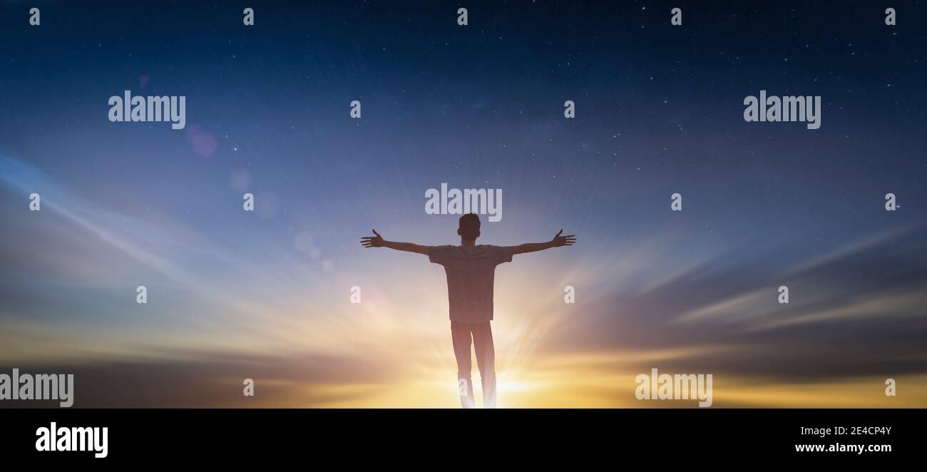 Happy man thinking felling ambitious empowerment energy vision on moutain background. Christian prayer love freedom worship praise God. Strength coura Stock Photo
