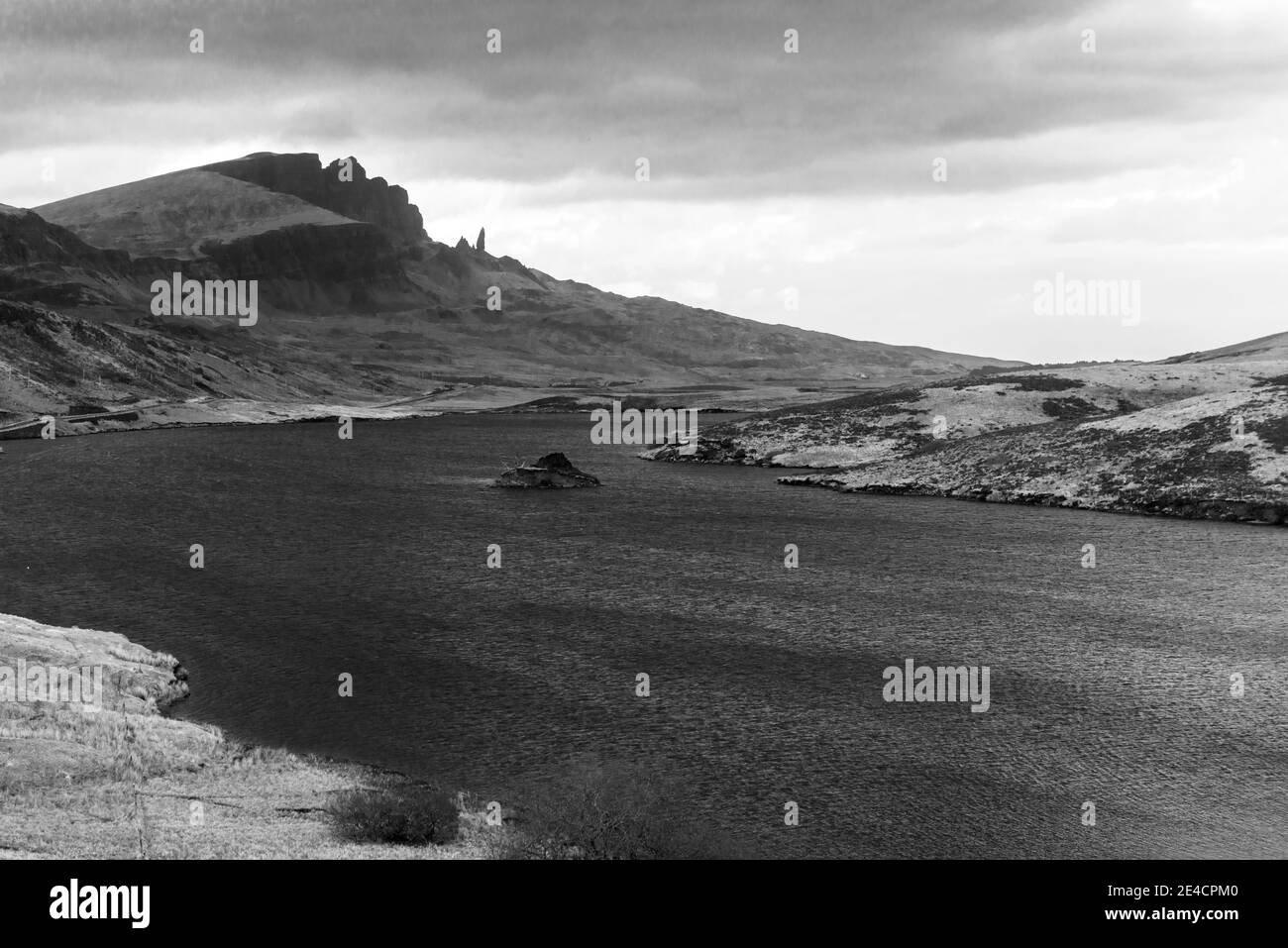 Great Britain, Scotland, Inner Hebrides, Isle of Skye, Trotternish, lake overlooking Old Man of Storr Stock Photo