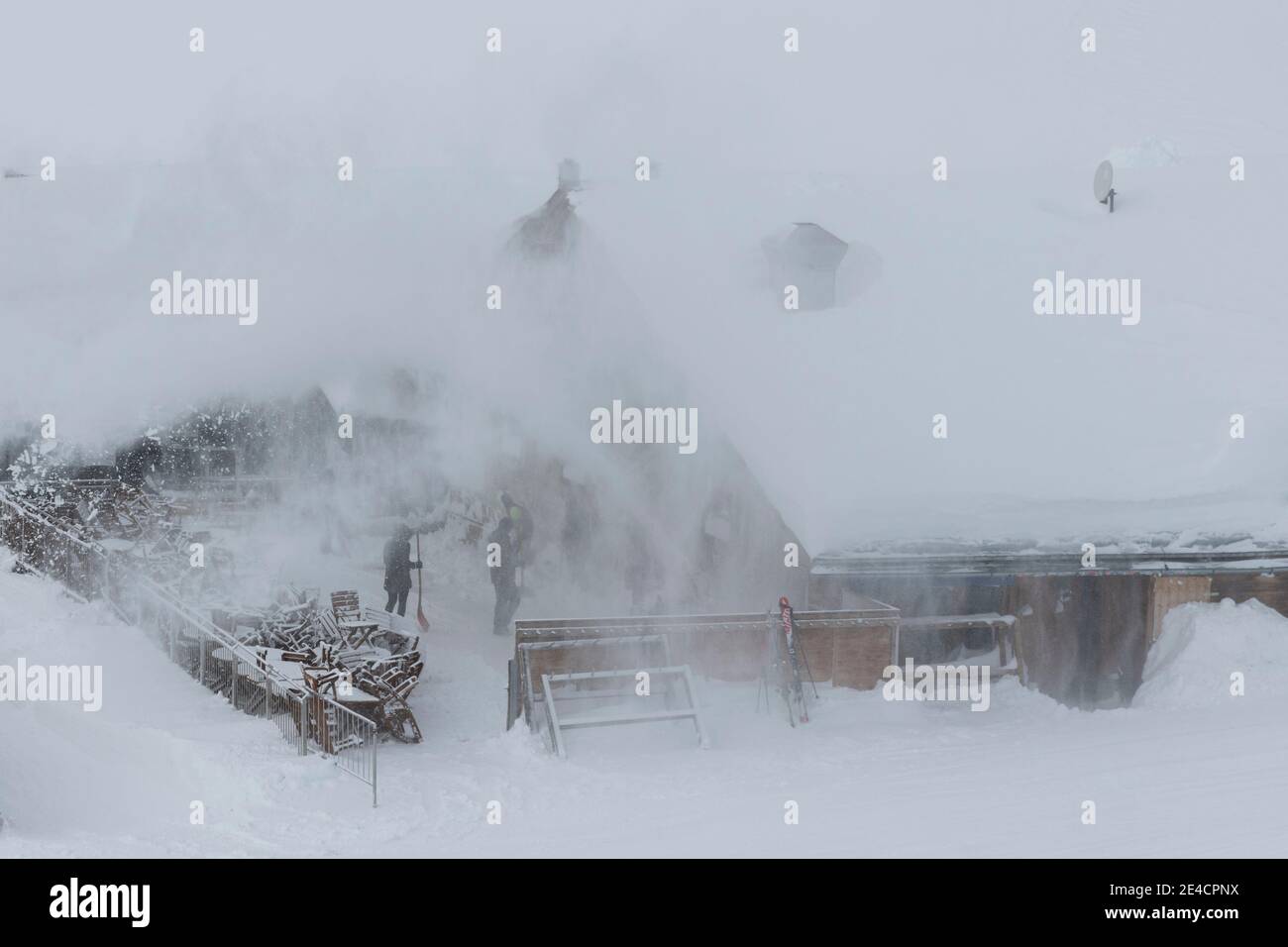 Austria, Tyrol, Ischgl, Switzerland, Graubünden, Samnaun, clearing snow on Alp Bella Stock Photo
