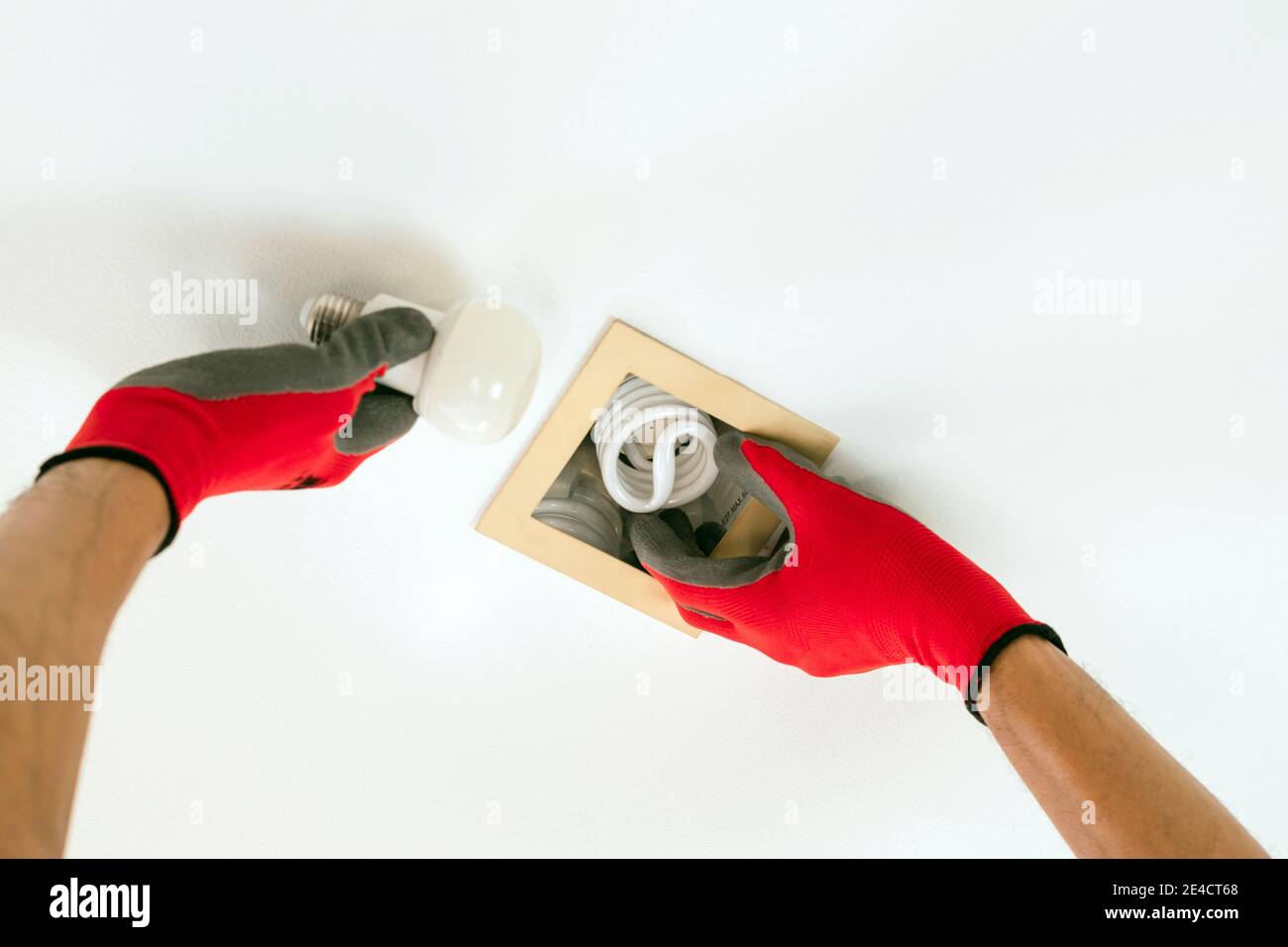 Replace the broken fluorescent light bulbs with LED bulbs. Stock Photo