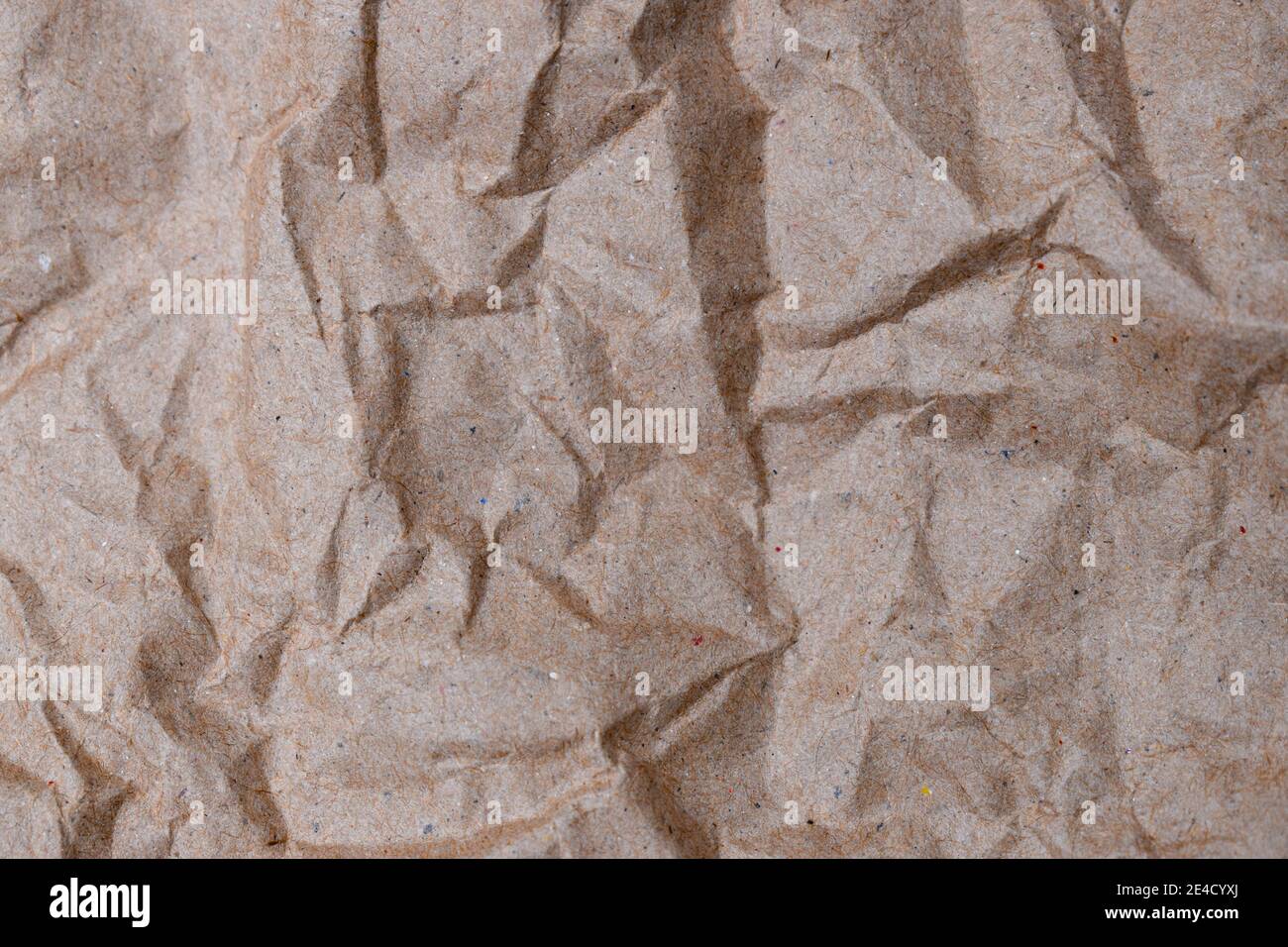 Closeup of the crumpled paper in the background Stock Photo